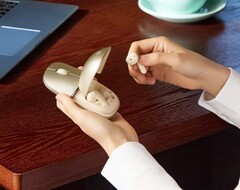 Honor hides wireless earbuds in a computer mouse.