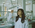 A decorative image showing a person in a lab setting