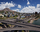 A screengrab from City Masterplan showcasing complex road networks with skyscrapers and buildings in the background