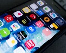 Close-up of a smartphone screen with many app icons
