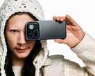 A model holding the new Nothing Phone (4a) Pro.