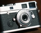 The Brightin Star 28 mm f/2.8 full-frame lens is barely larger than a camera body cap.
