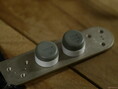 The ZSA Voyager's carrying case comes with a metal tab for magnetic feet storage