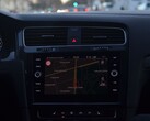 Car dashboard with a navigation map on the infotainment screen