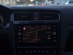Car dashboard with a navigation map on the infotainment screen