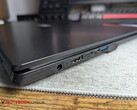 Laptop with barrel connector next to two USB-C ports