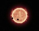 An artist's illustration showing a star and two planets.