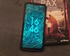 The Fire 7 Pro next to a book. (Image source: Sergey Tarasov - Notebookcheck)