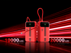 Two red Honor Life power banks with built-in displays and attached USB-C cables