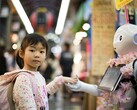 Princeton warns of context manipulation attacks on Web3 AI agents. Pictured: A girl holding a robot's hand (Image source: Andy Kelly, Unsplash)