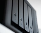 Close-up of the drive bays of a black NAS enclosure