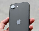 The iPhone 17e is expected to its predecessor's design. iPhone 16e shown in black. (Image source: Thai Nguyen & Unsplash)