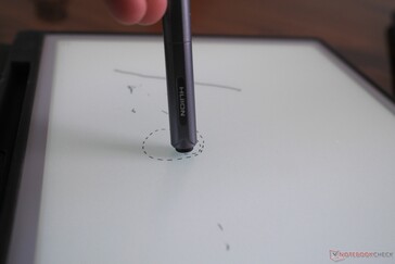 The other tip of the pencil can be used as an eraser. You get used to the input latency quickly. It's still noteworthy though.